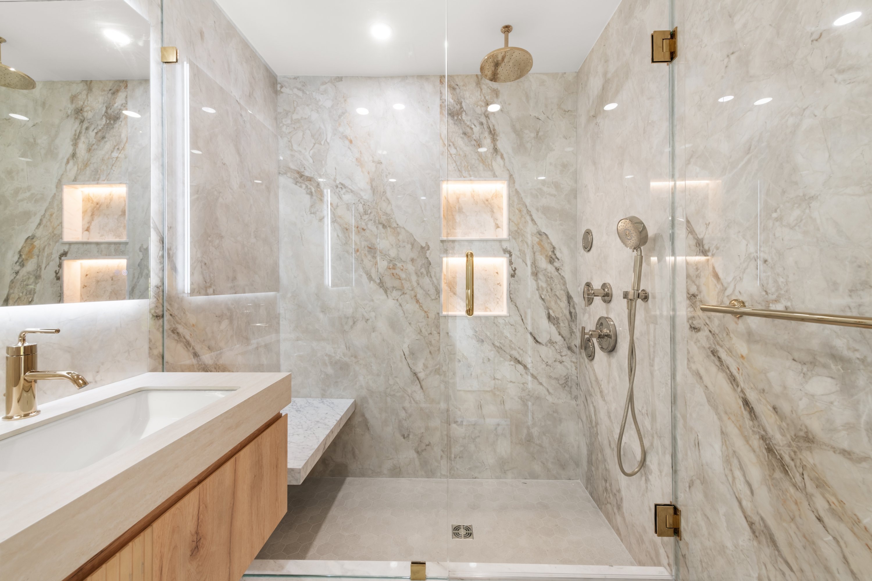 Primary bathroom with full marble surround